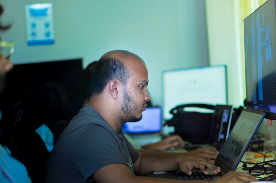 team of programmers in office