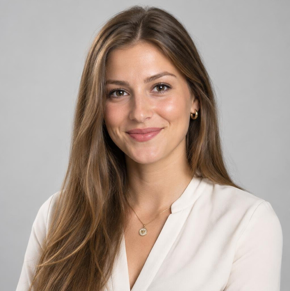 Studio portrait of a Croatian woman in her 20s wearing business casual clothing