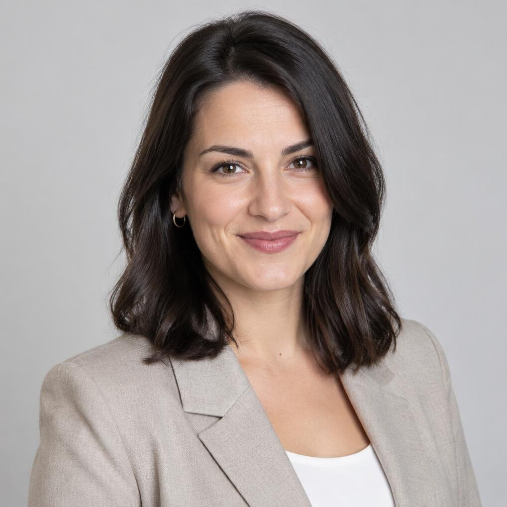 Studio portrait of a Croatian woman in her 30s wearing business casual clothing