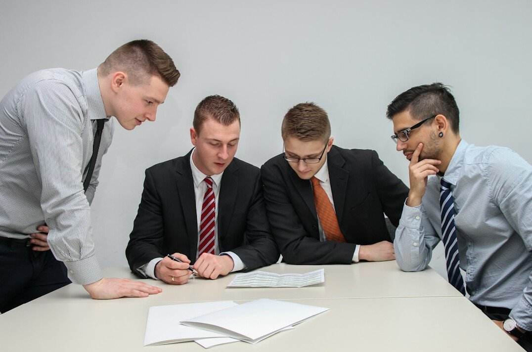 business team reviewing software